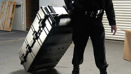 Peli 1780HL Rifle Case - Being pulled while rolling on its edge castor wheels